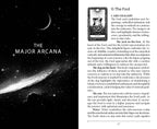 Page from a book or magazine featuring the Major Arcana card 'The Fool' with celestial imagery.