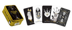 Set of tarot cards with a yellow tin box on a white background