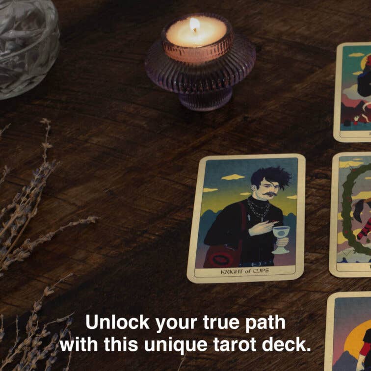 Tarot cards on a wooden surface with a lit candle, herbs, and text overlay.