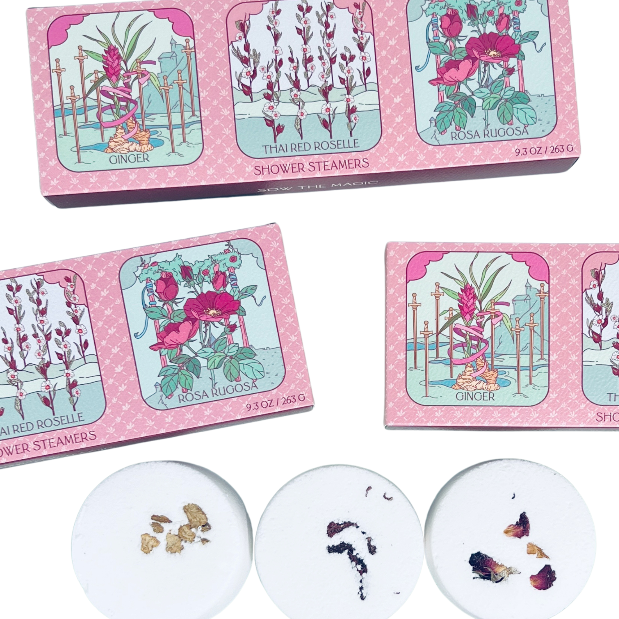 Shower steamers with botanical designs in pink packaging on a white background