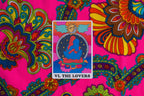 Card labeled 'VI. The Lovers' on a colorful, patterned background
