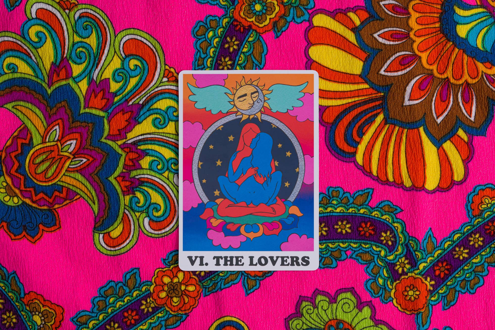 Card labeled 'VI. The Lovers' on a colorful, patterned background