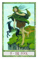 Tarot card featuring 'The Fool' with a person and black goat on a green landscape