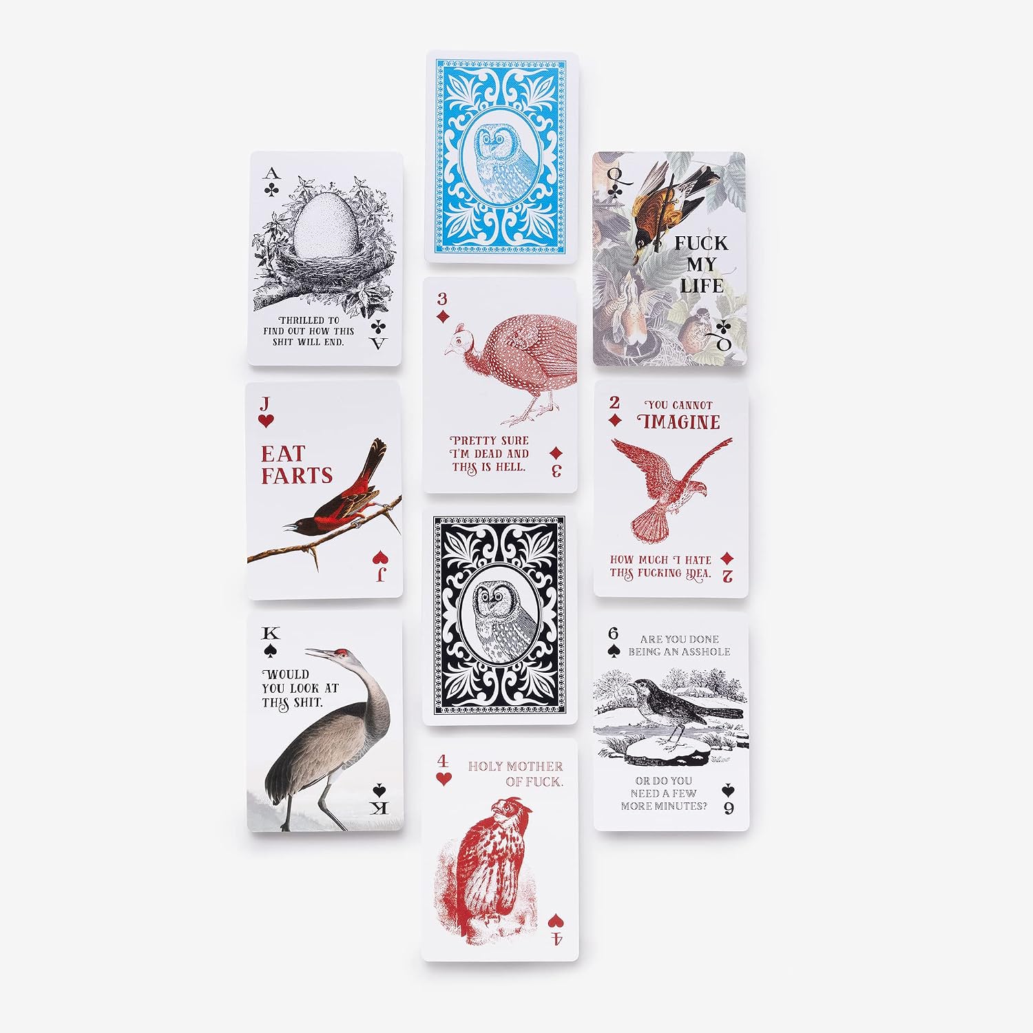Set of playing cards with various designs and text on a white background
