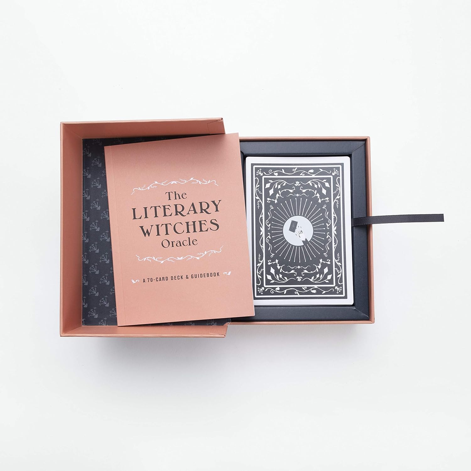 The Literary Witches Oracle set in an open box on a white background