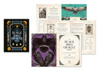 The Black Bird Oracle Deck and its contents are displayed on a clean white background, including the black cover with gold and blue illustrations, the purple cover with black bird artwork, the cream booklet insert, and the teal card insert.