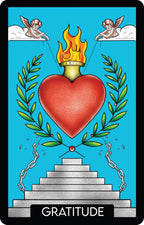Card with a red heart, flames, and cherubs on a blue background, labeled 'Gratitude'.