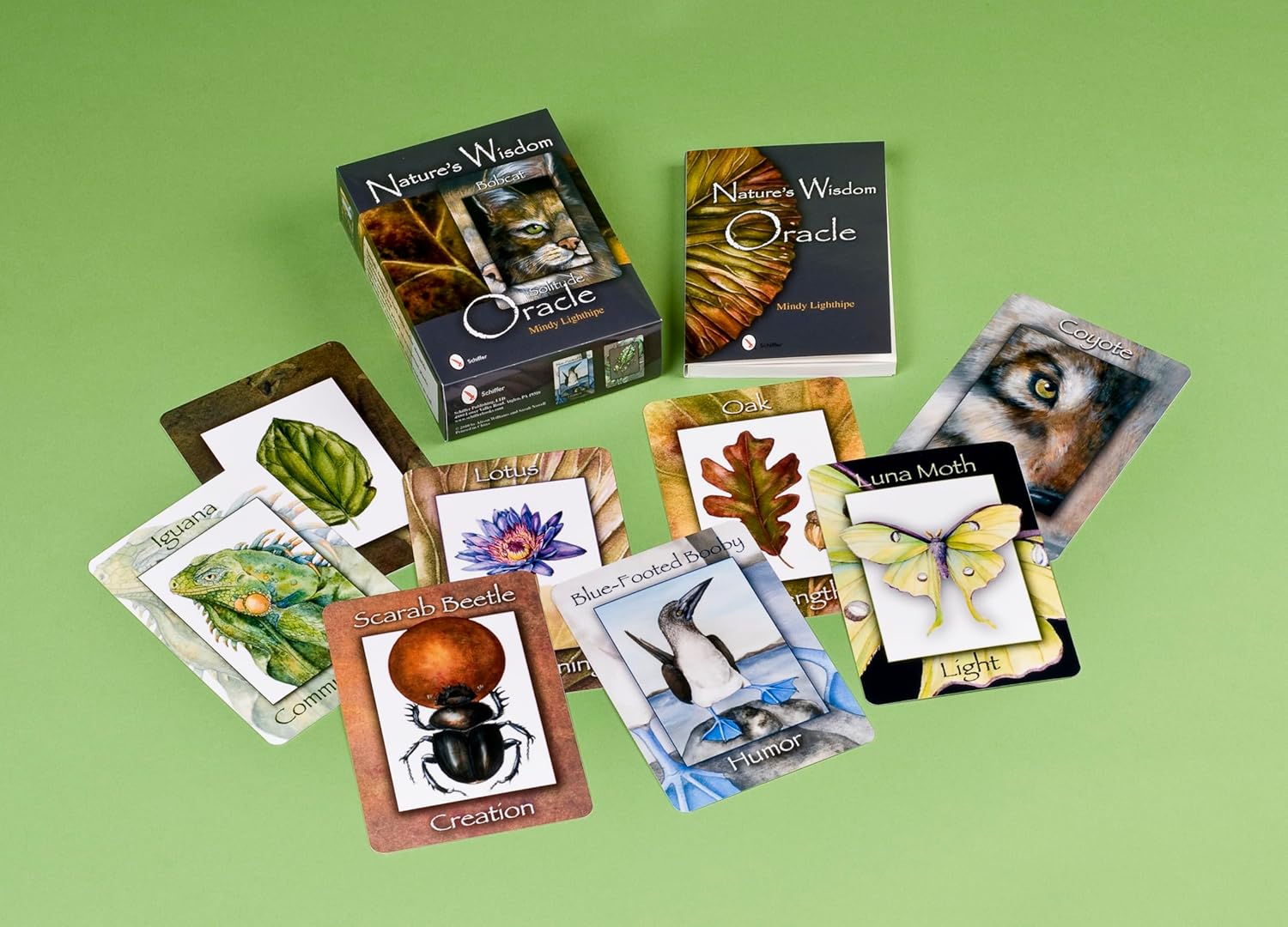 Nature-themed oracle cards on a green background