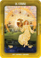 Citrine tarot card with a woman holding a crystal ball, surrounded by gold balls and nature elements.