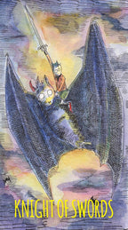Card titled 'Knight of Swords' featuring a dragon and a cat with a sword, set against a colorful background.