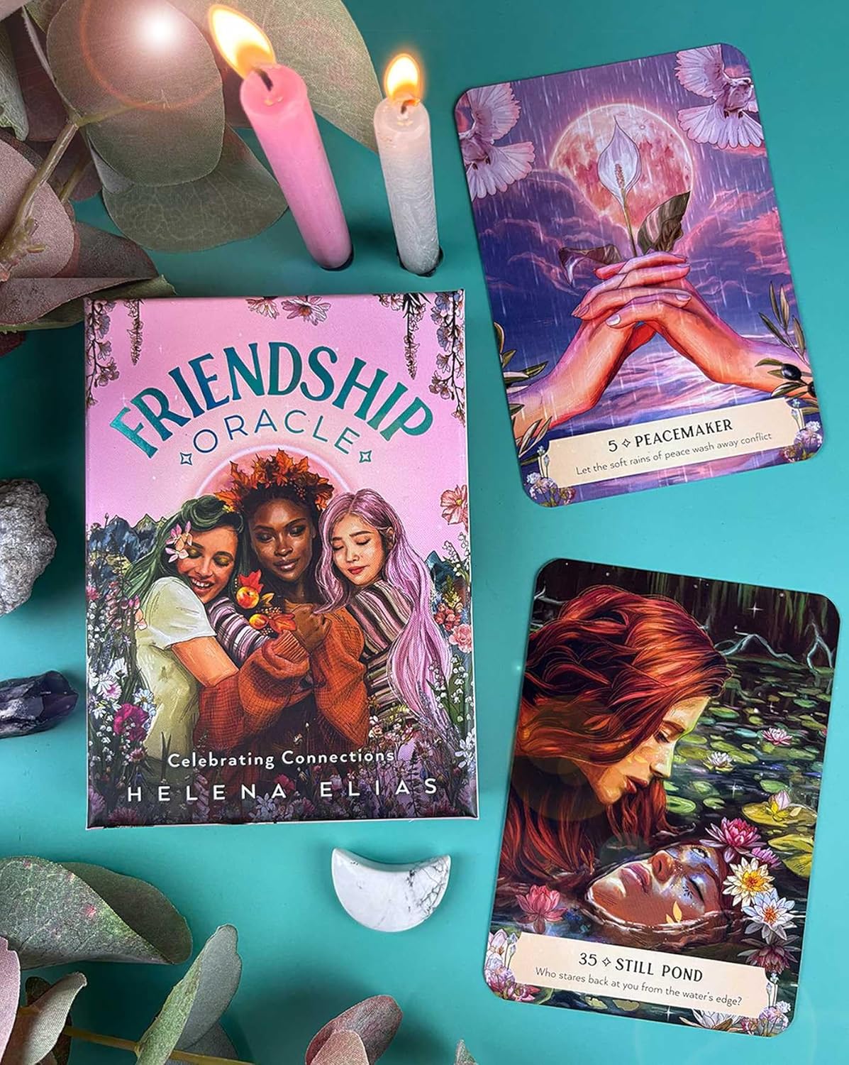 Friendship Oracle book with tarot cards on a teal background