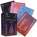 Set of tarot cards titled 'The Light in the Dark Oracle' by Lucia Dami, with colorful card backs featuring celestial designs.