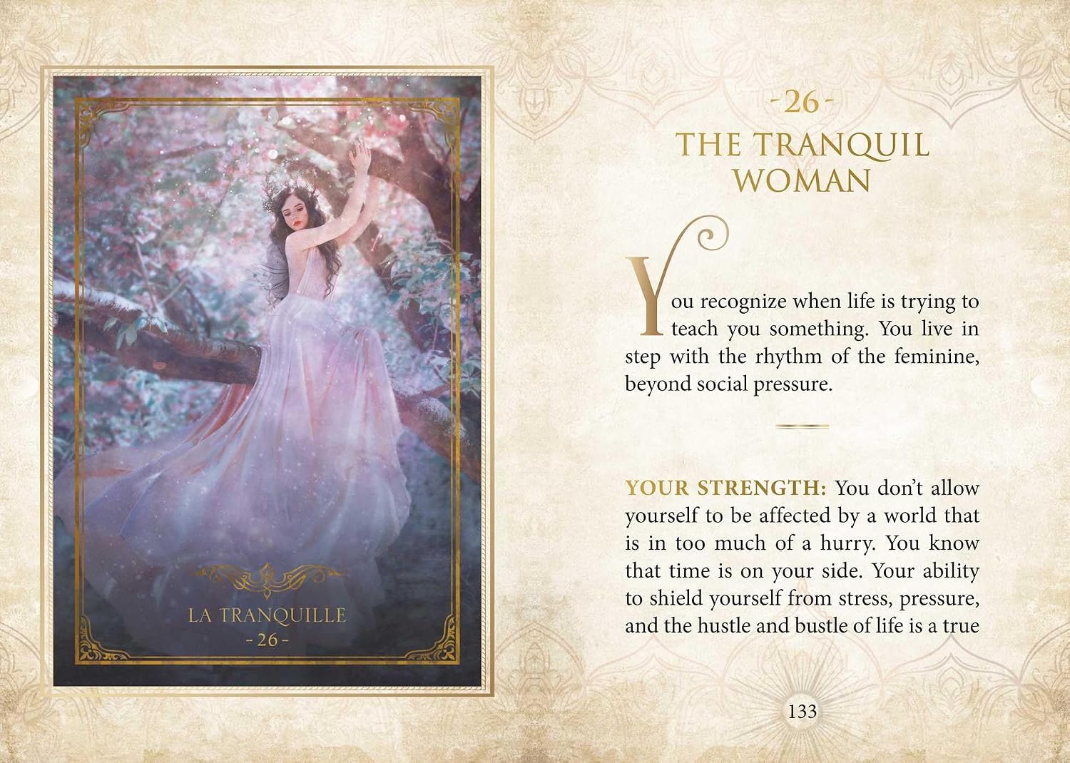A printed page or card design with a framed artwork on the left showing a woman in a flowing pale pink gown standing in a tree, and text on the right titled 'THE TRANQUIL WOMAN' with descriptive copy. The page has a warm beige background with decorative border details.
