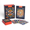 Bovinefire Tarot cards with colorful designs and a box on a white background