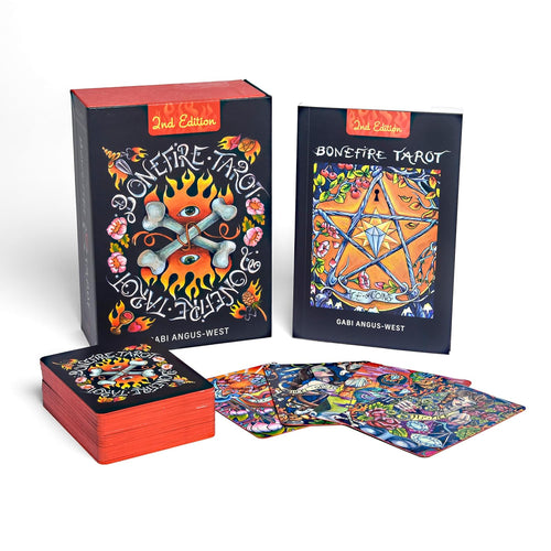 Bovinefire Tarot cards with colorful designs and a box on a white background