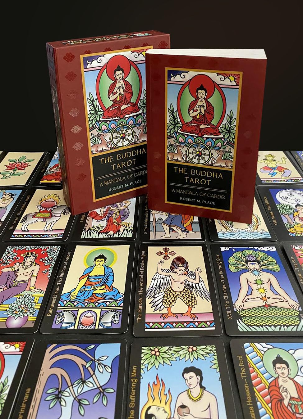 Buddha Tarot cards with colorful illustrations on a dark background