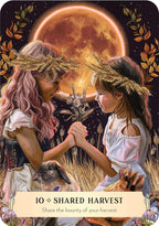 Two girls with wheat crowns holding hands in front of a full moon, with text 'Shared Harvest' at the bottom.