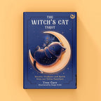 Book titled 'The Witch's Cat Tarot' on a yellow background