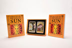 Oracle of the Radiant Sun cards with packaging on a white background