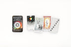 Collection of tarot cards and a book on a white background