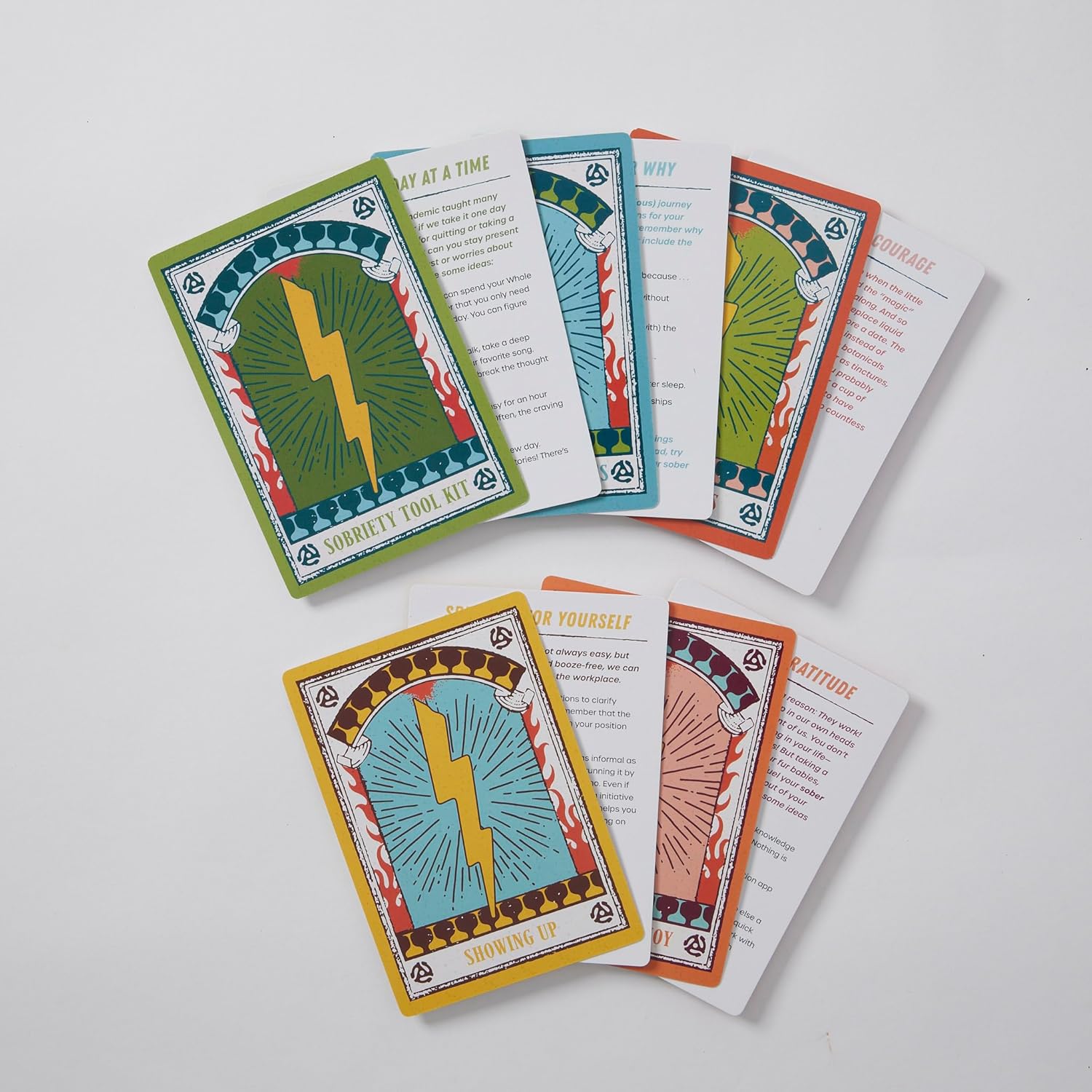 Set of colorful tarot cards on a white background