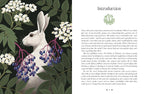 Book page with a rabbit illustration surrounded by foliage and flowers, and text on the right.