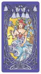 Art Nouveau-style card featuring a woman with red hair and a heart, surrounded by floral elements.