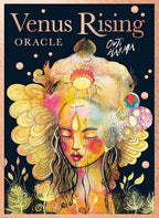 Venus Rising Oracle card deck box cover by Out Karma, featuring a colorful, psychedelic illustration of a woman's face with large decorative hair and floral elements on a dark background.