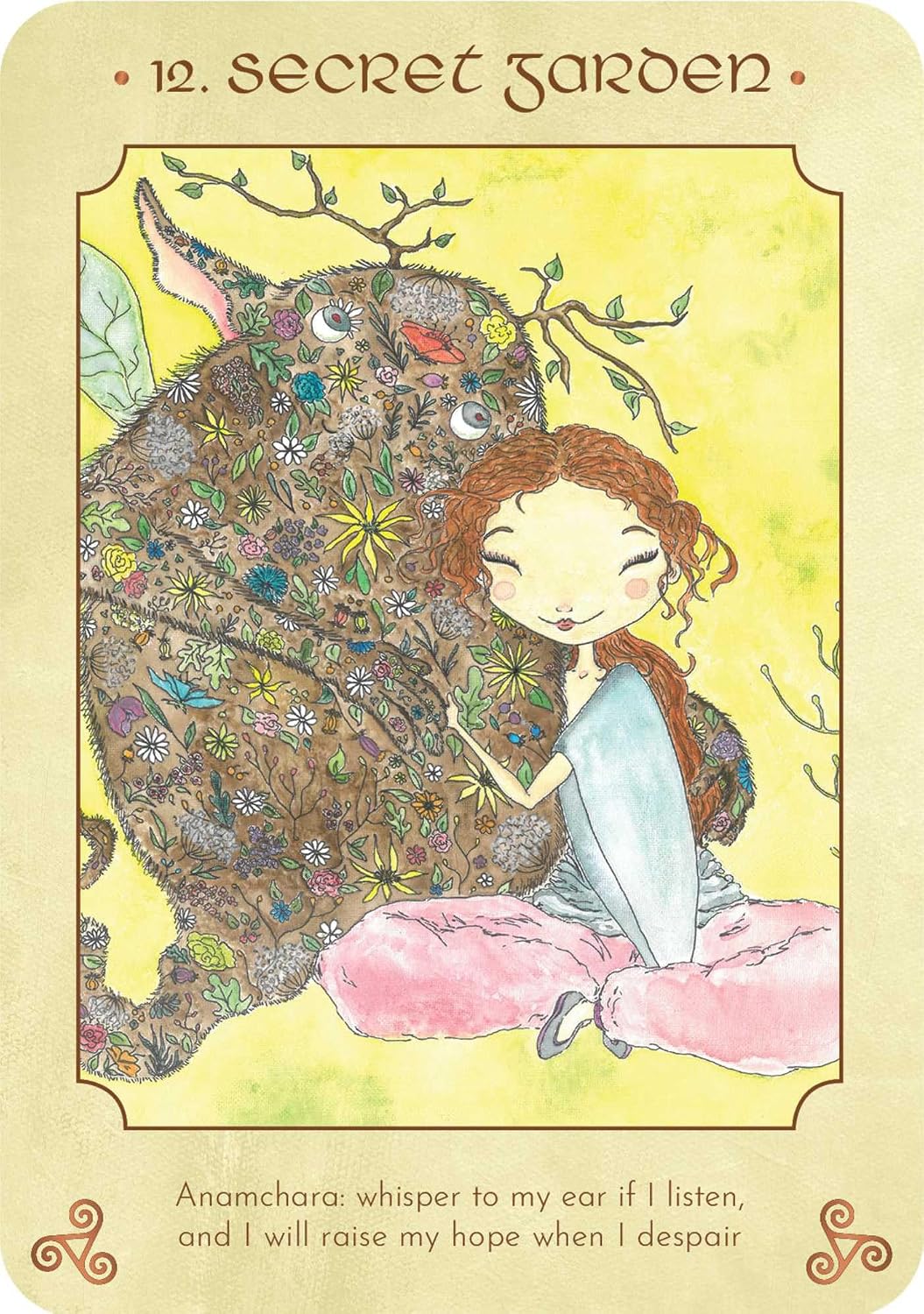 Anamchara '12. Secret Garden' oracle card featuring an illustration of a girl with red hair sitting on the ground next to a large, flower-covered creature on a yellow-green background.