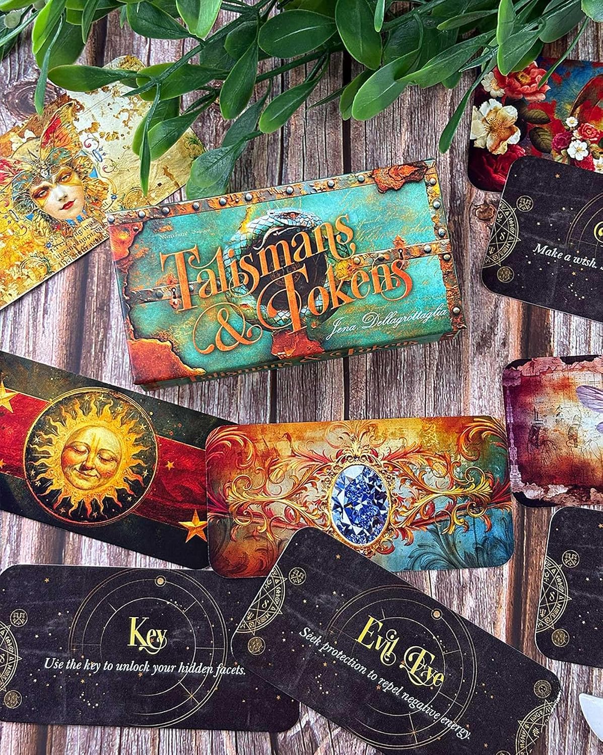 Colorful tarot cards with intricate designs on a wooden surface.