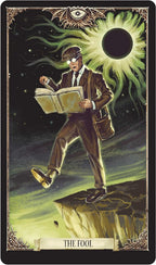 Tarot card featuring a character reading a book with a green glowing orb and eye symbol in the background.