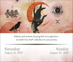 A square art print or card design with a pink and peach upper section featuring a black silhouette of a hand, a crow, a crescent moon, an eye motif, and decorative line art. The lower section is white with the text, 'Embrace each moment, knowing that every experience—no matter how small—adds flavor to your journey.