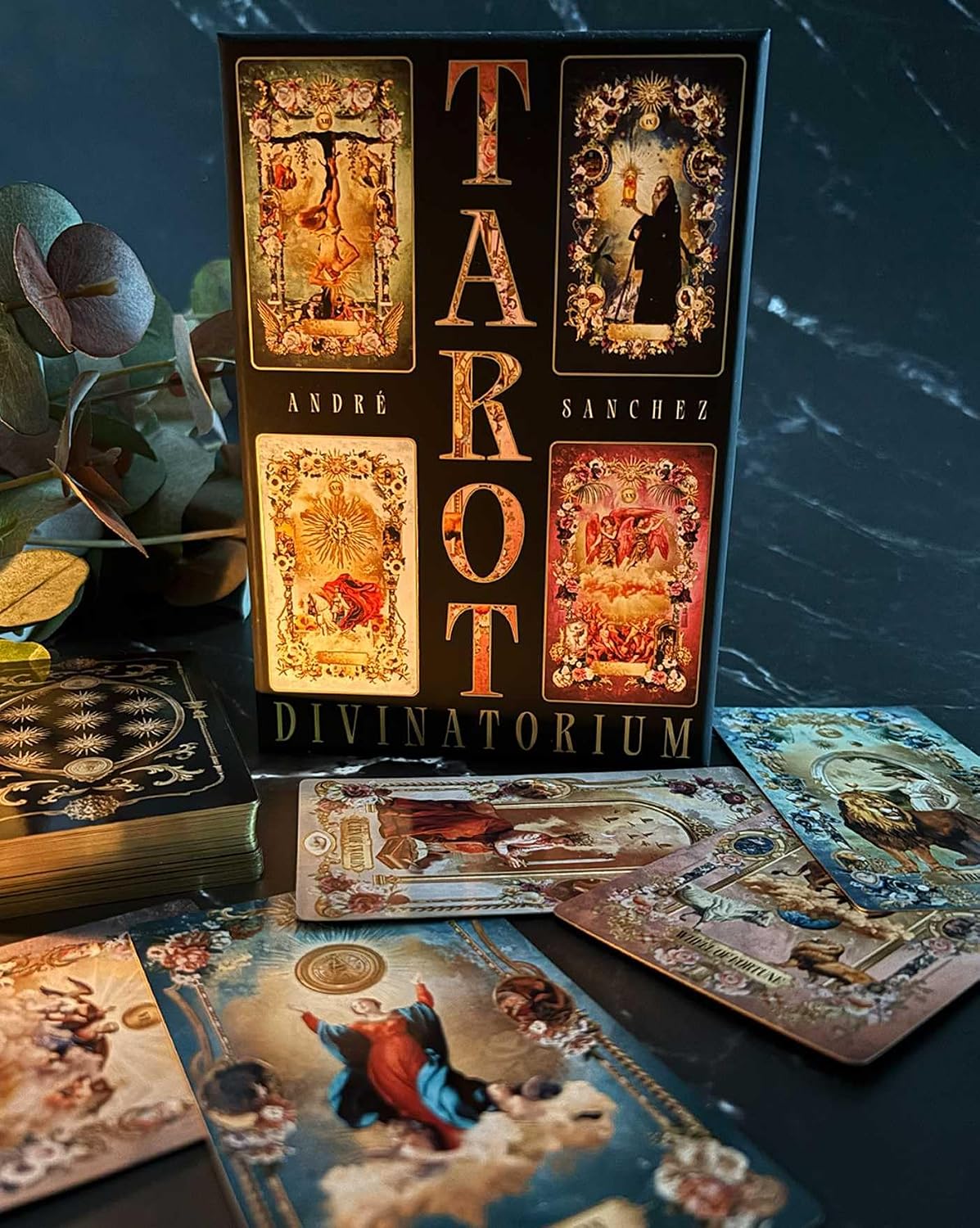 Tarot card set with decorative packaging on a dark background