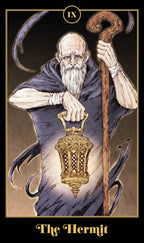 Tarot card featuring 'The Hermit' with an old man holding a lantern and staff.