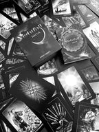 Collection of 'Nightfall Tarot' cards with a box on top, featuring black and white artwork.