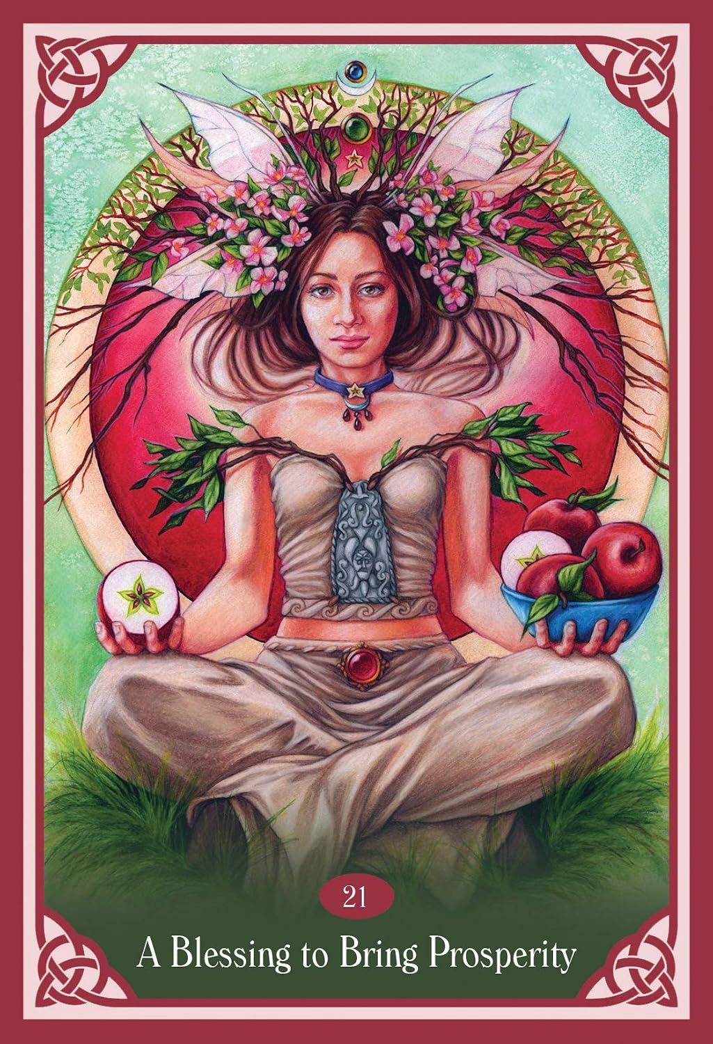 A tarot card illustration titled 'A Blessing to Bring Prosperity' showing a seated woman with a floral crown, wings, and fruit, framed by a red Celtic border. This is a Product/Packaging subject type as it represents the card design itself.