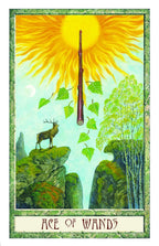 Tarot card featuring a stag, wand, and sun with 'Ace of Wands' text