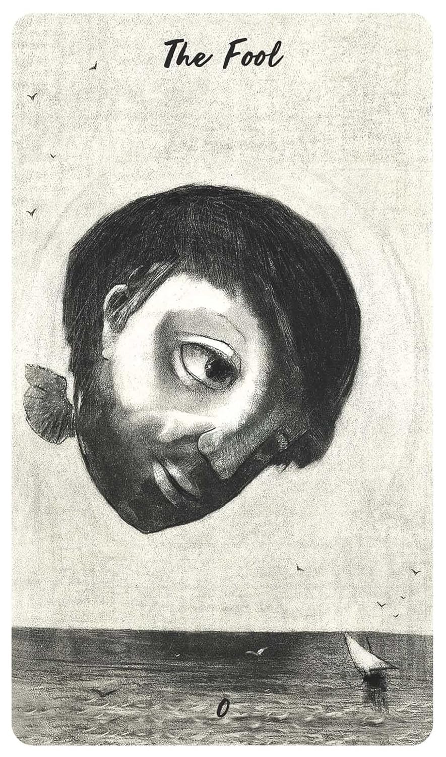 Card titled 'The Fool' with a stylized face and minimalistic design.