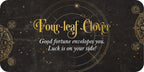 Decorative card with 'Four-leaf Clover' text and symbols on a dark background