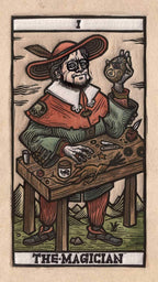 Card from a tarot deck featuring 'The Magician' with a person in a red hat and coat at a table.