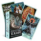 Mythologia Fennica Tarot cards with a book on a white background