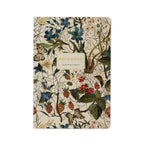 Notebook with floral and butterfly design on a white background