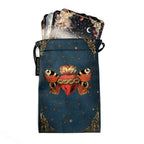 Drawstring bag with butterfly design containing tarot cards on a white background