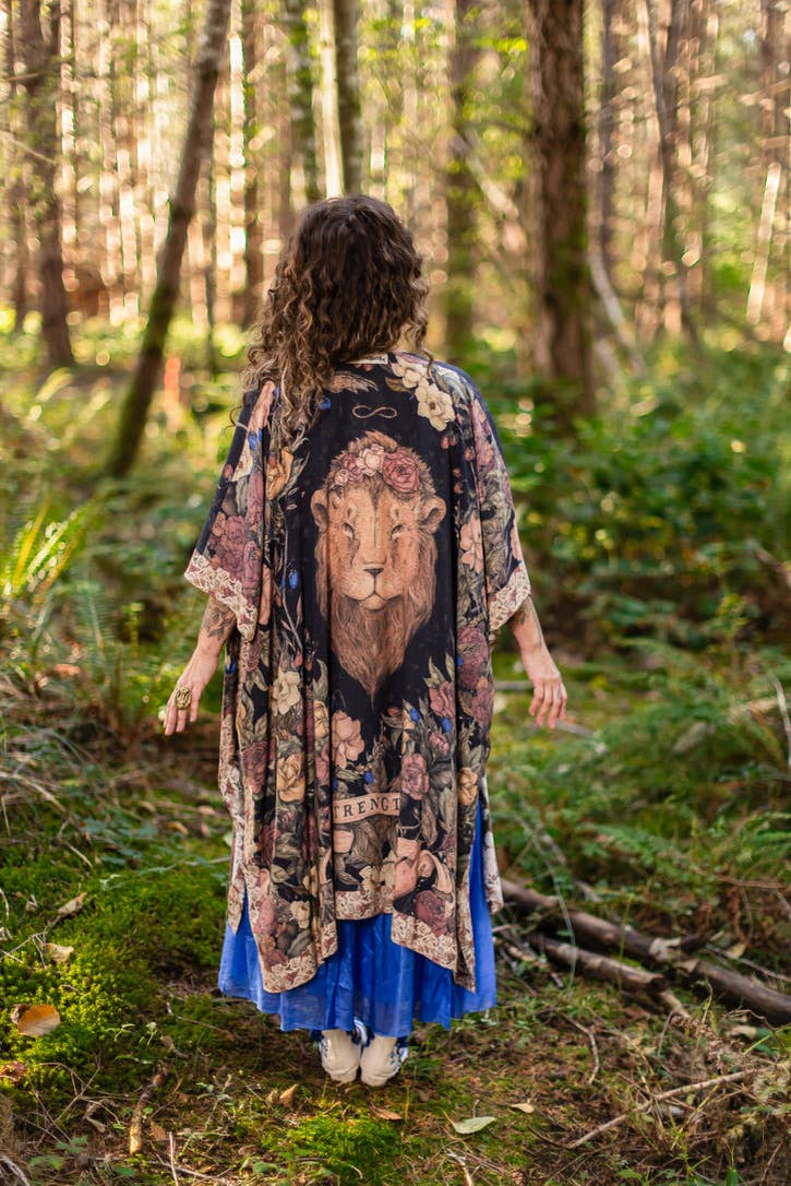 Woman in a patterned kimono walking through a forest