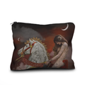 Pillow with a design of a woman and a horse against a sunset sky.