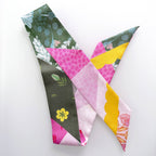 Colorful quilted fabric patchwork on a white background