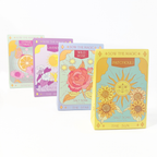 Set of colorful soap packaging with floral designs on a white background