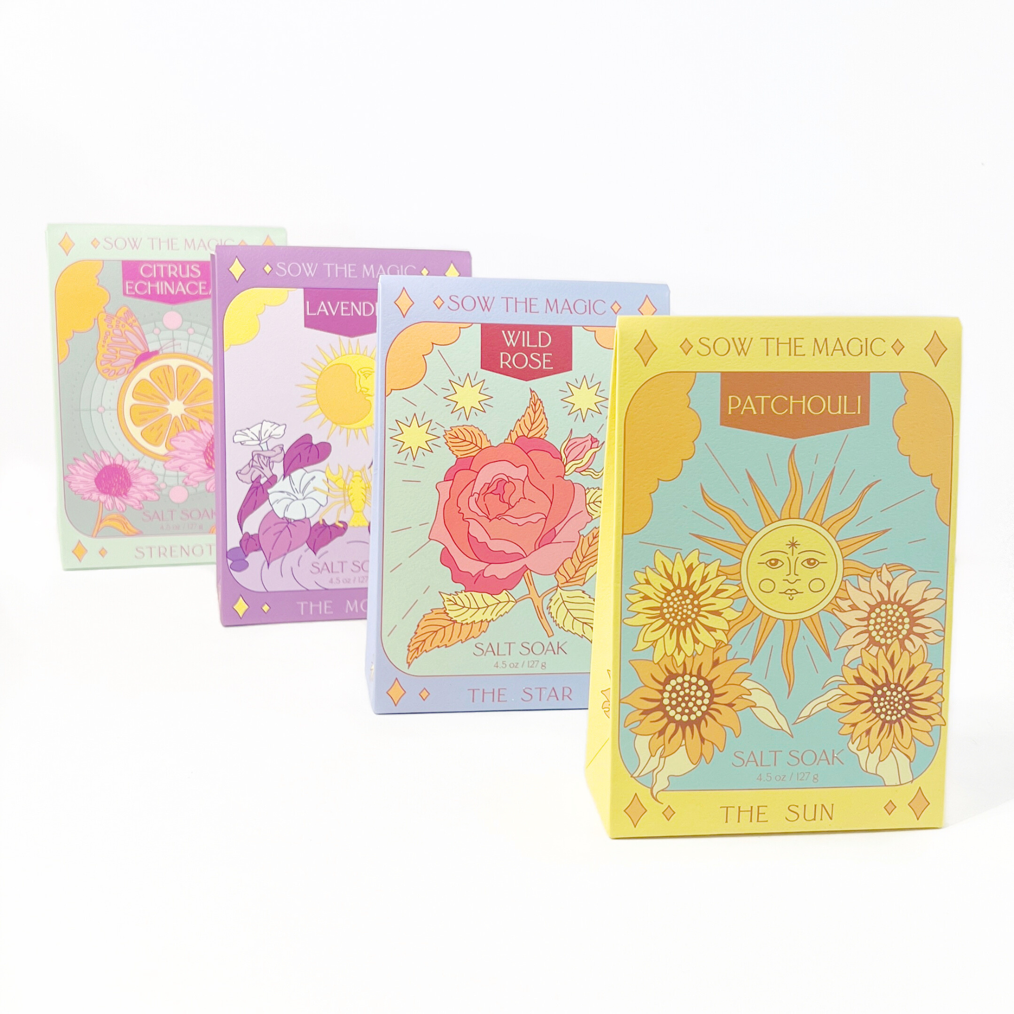 Set of colorful soap packaging with floral designs on a white background