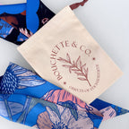 Bouchette & Co. branded pouch with floral designs on a white background