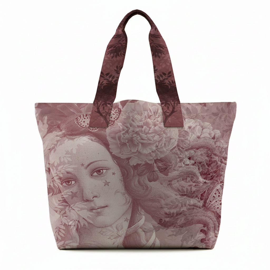 Tote bag with a design of a woman's face and floral elements on a white background